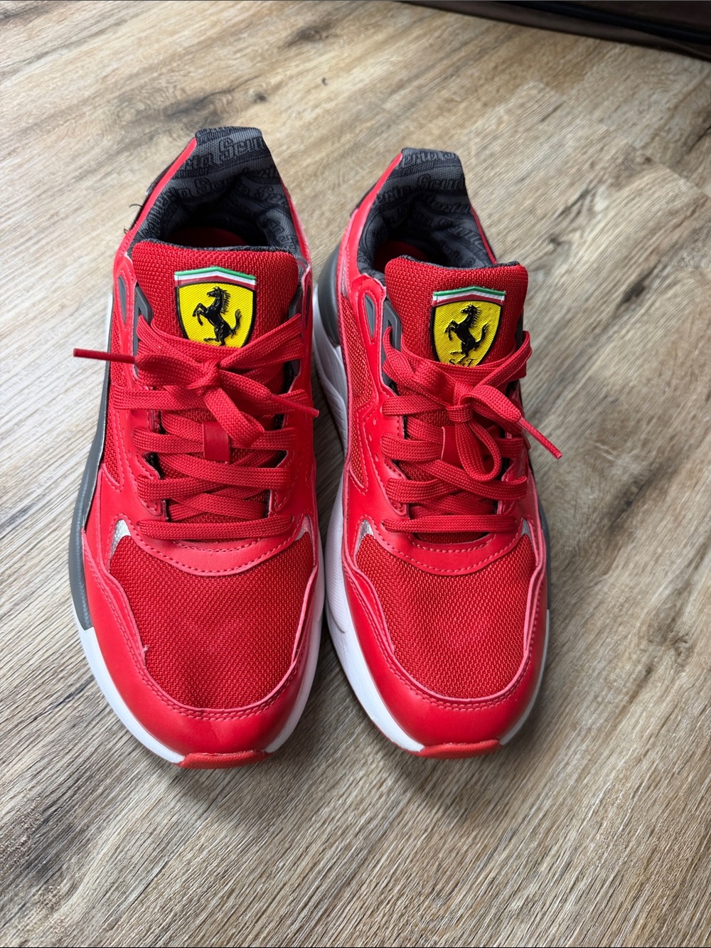 Puma Ferrari Red Kids Sneakers with Yellow Shield and Black Accents